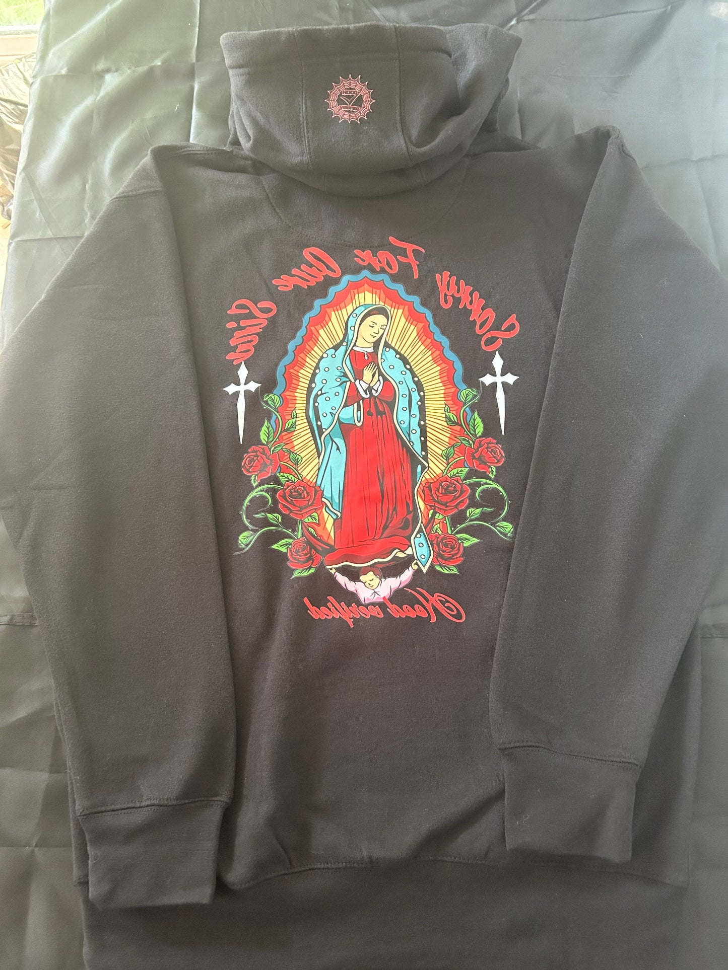 'Sorry for our sins" Virgin Mary black hoodie red font